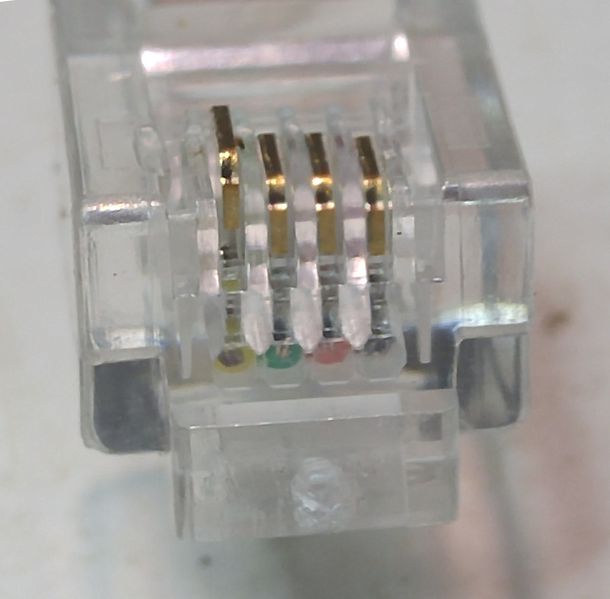 File:RJ11 bad crimp.jpg