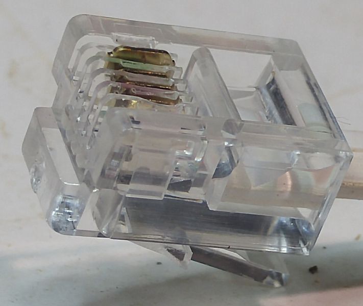 File:RJ11 bad crimp2.jpg